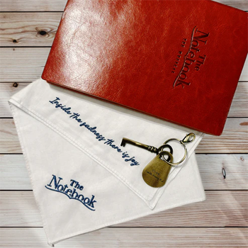 leather notebook and embroidered handkerchief from "The Notebook" musical