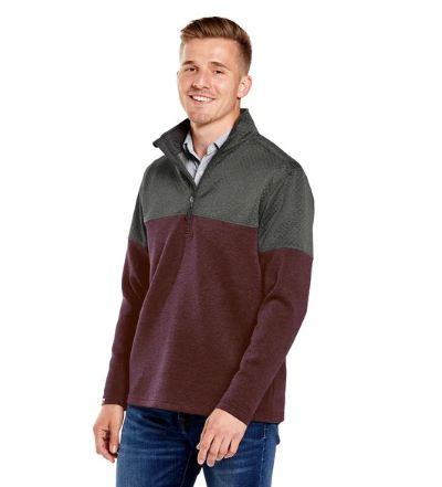 man wearing colorblock quarter-zip pullover with quilted gray shoulders and maroon arms and torso