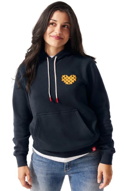 woman wearing nvy blue hoodie with waffle fry heart embroidery