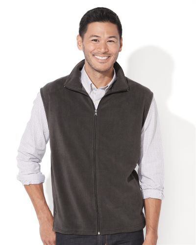 man wearing charcoal gray fleece vest full zip over white shirt