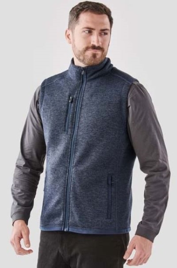 man wearing heather blue performance full-zip vest by Stormtech