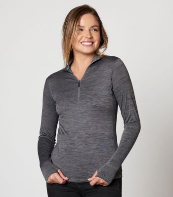 woman wearing quarter-zip pullover with thumb holes, gray
