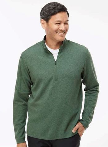 man wearing green quarter-zip Adidas pullover sweater