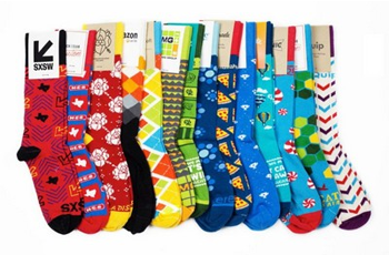 a variety of custom woven socks in bright colors