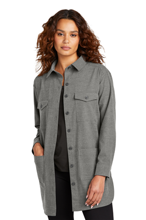 woman wearing long shirt jacket with buttons and chest pockets