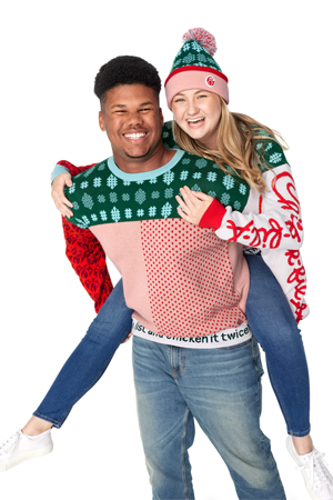 Chick‑fil‑A holiday themed sweater features a Waffle Fry pattern at the top and “Making a list and chicken it twice” on the hem.